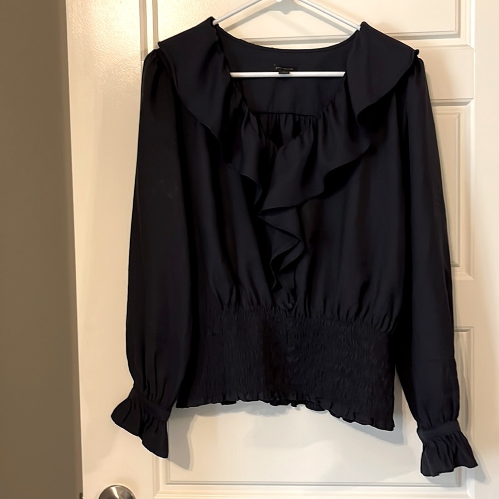Ann Taylor navy women’s blouse.